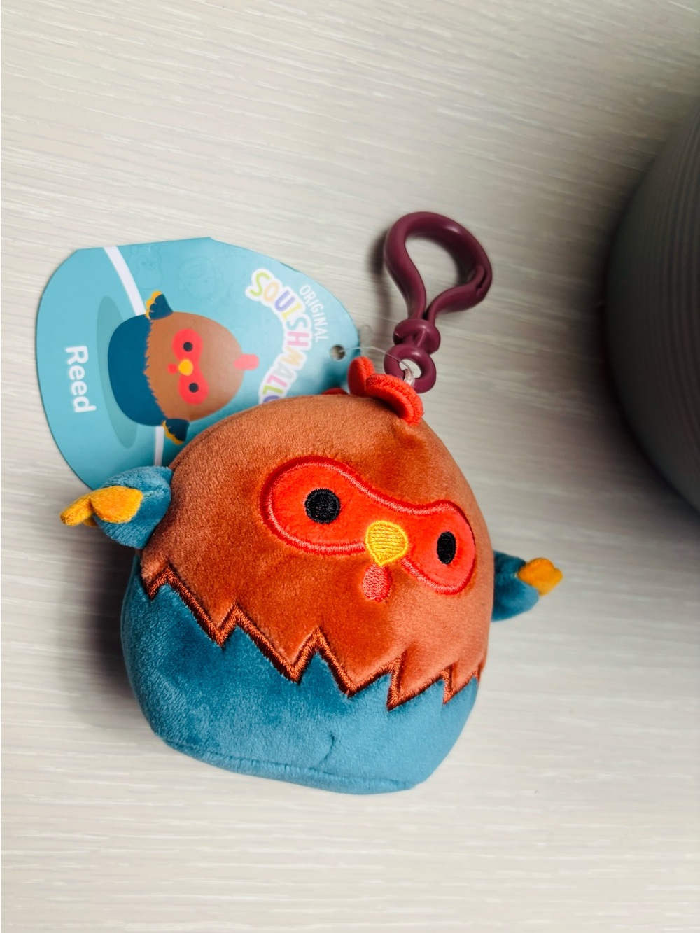 Squishmallows Reed Owl Plush Clip - Orange & Blue with Purple Clip